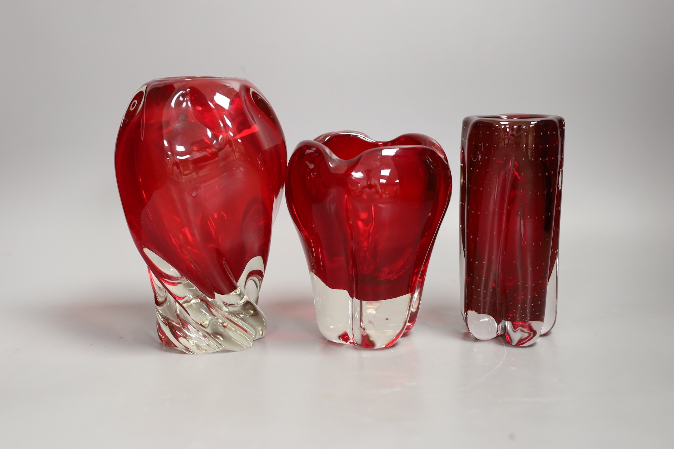 Three Whitefriars red glass vases, tallest 18cms high